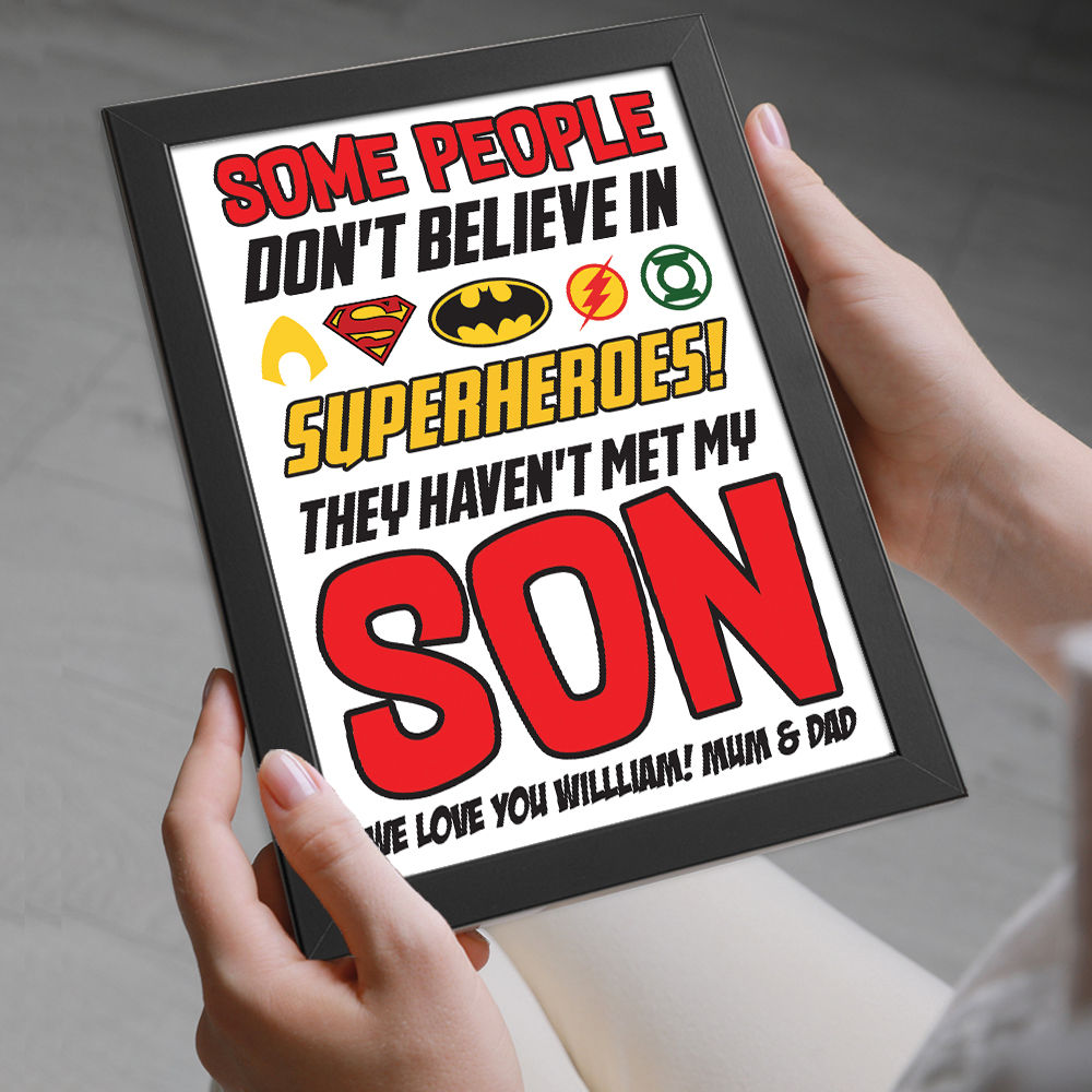 Personalised You&#39;re My Superhero Gift for Son in black frame being held