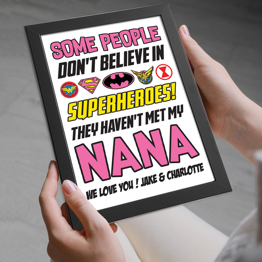 Personalised You&#39;re My Superhero Gift for Nana in black frame being held